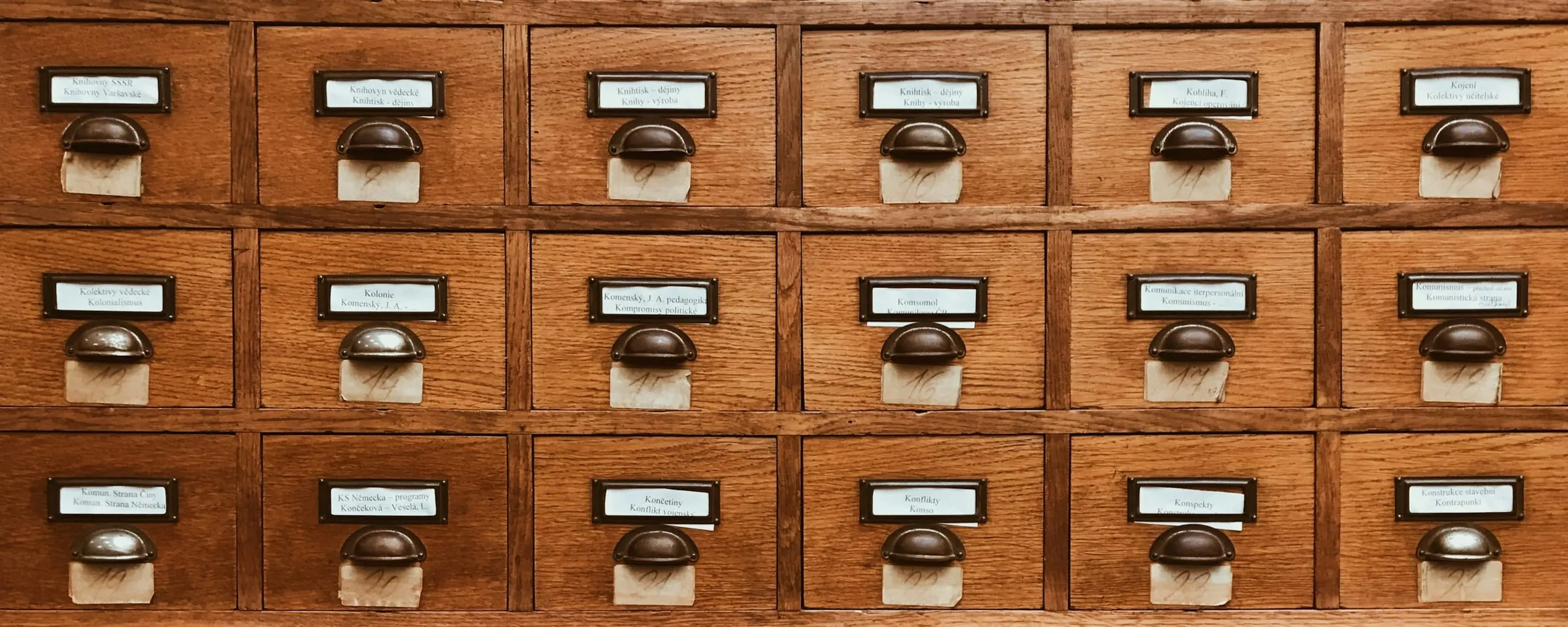 Knowledge management and entity resolution - the drawers of a library card catalog, one card per thing